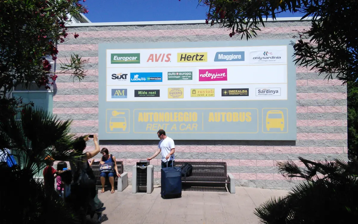 Sign with the logos of car rental companies Europcar, Avis, Hertz and Sixt at an airport