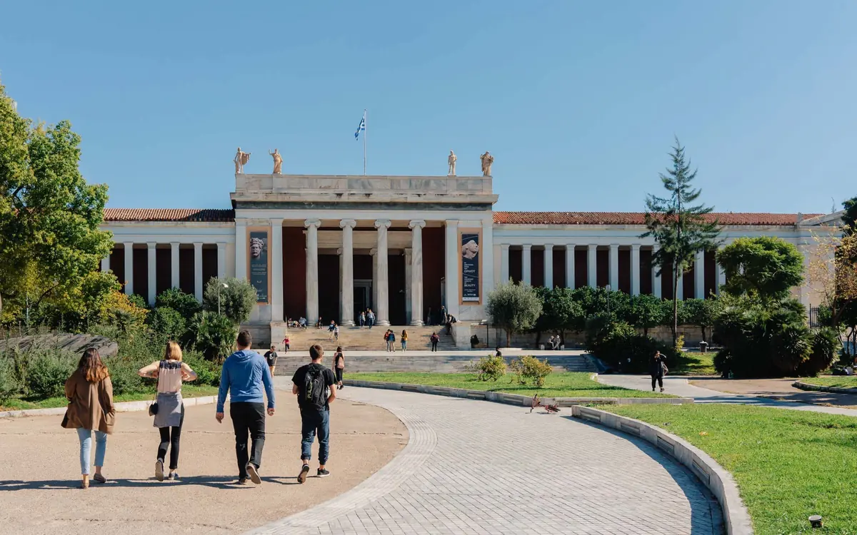 The garden path of the National Archaeological Museum with benches and trees